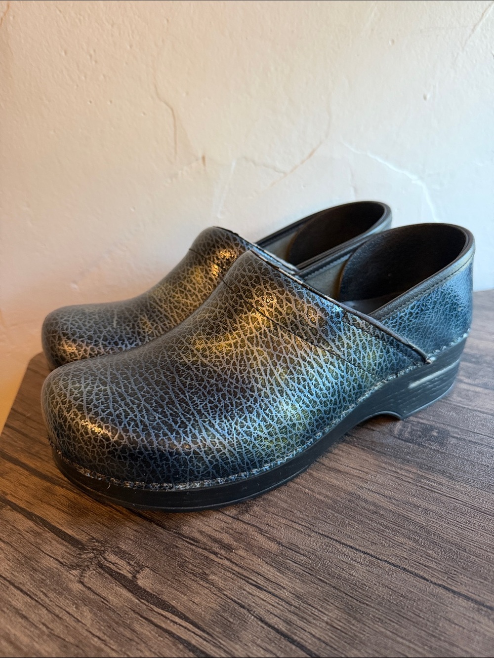 Dansko Women's Black Textured Leather Clogs